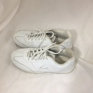 Athletic white (cheer) shoes.